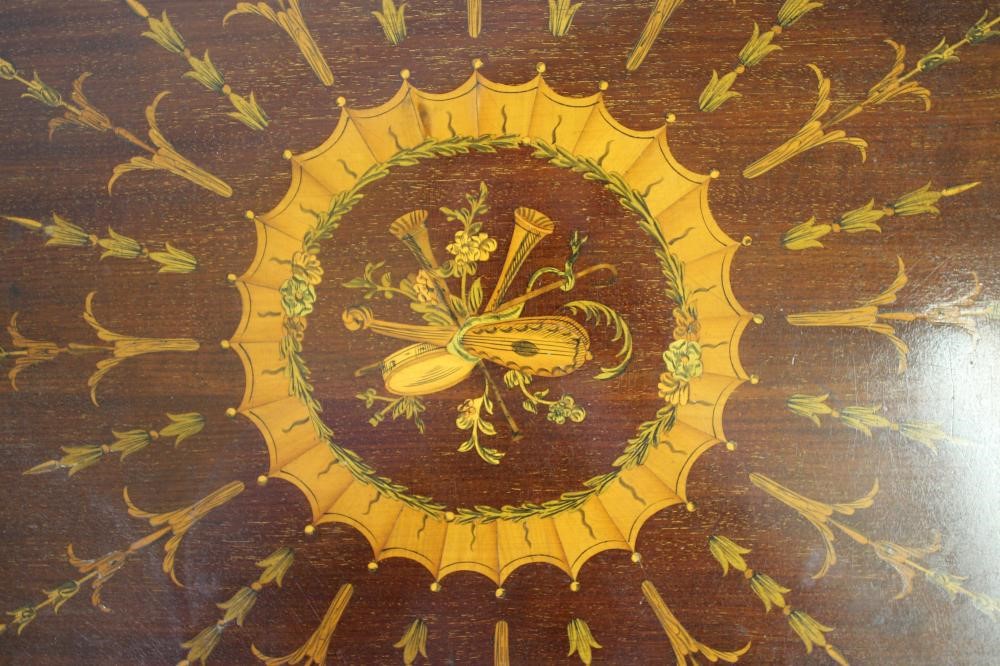AN EDWARDIAN MAHOGANY AND MARQUETRY OCCASIONAL TABLE of earred circular form Image