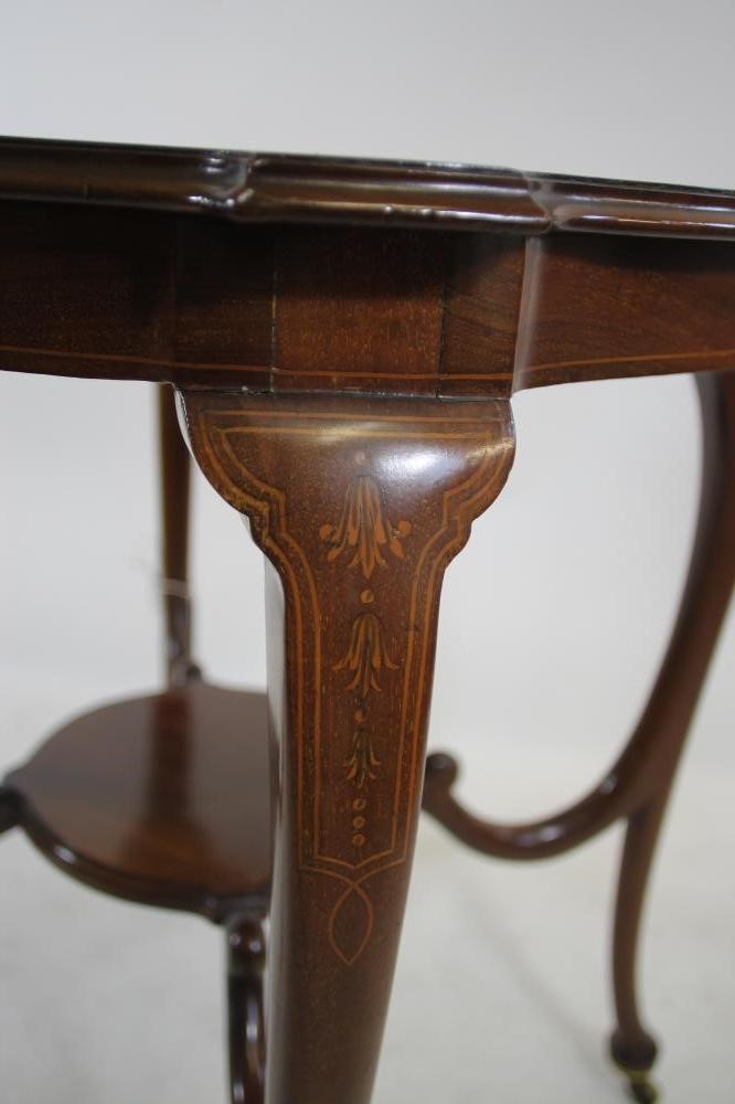AN EDWARDIAN MAHOGANY AND MARQUETRY OCCASIONAL TABLE of earred circular form Image