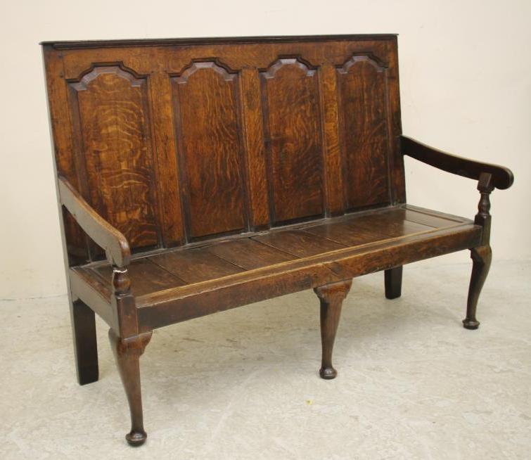 A GEORGIAN OAK SETTLE Image