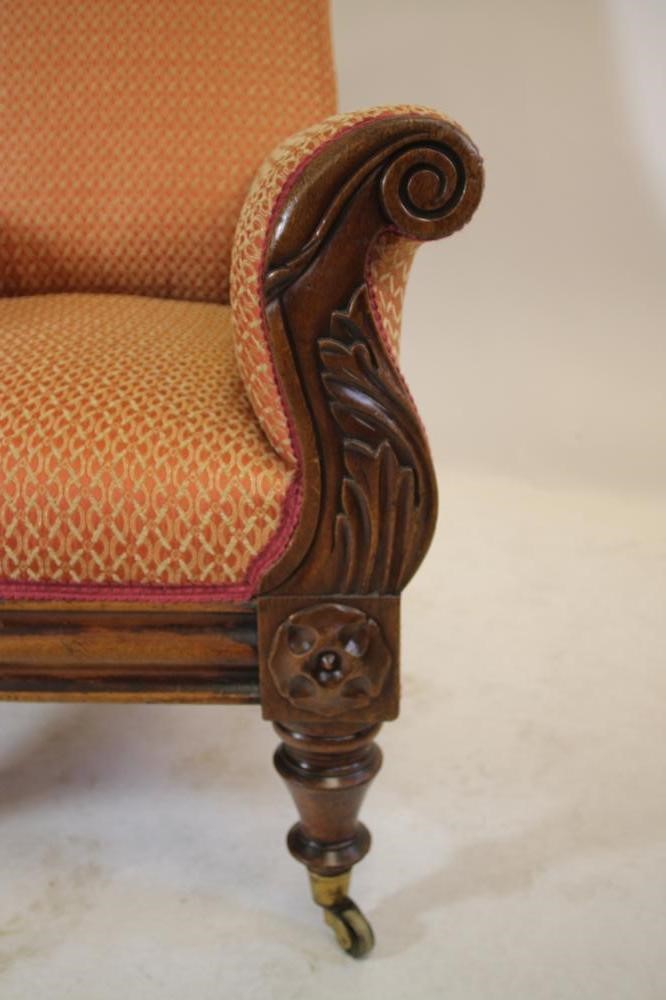 A GEORGE IV MAHOGANY FRAMED ARMCHAIR upholstered in a rust weave Image