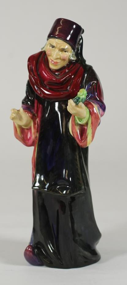 A ROYAL DOULTON EARTHENWARE FIGURE "The Alchemist" Image