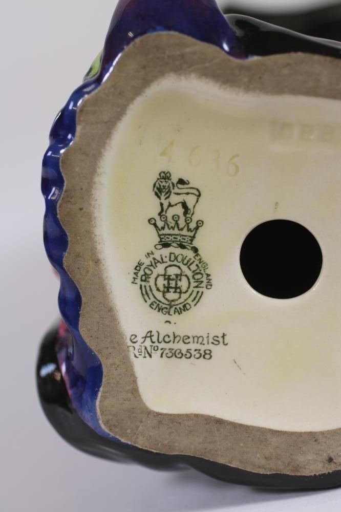 A ROYAL DOULTON EARTHENWARE FIGURE "The Alchemist" Image