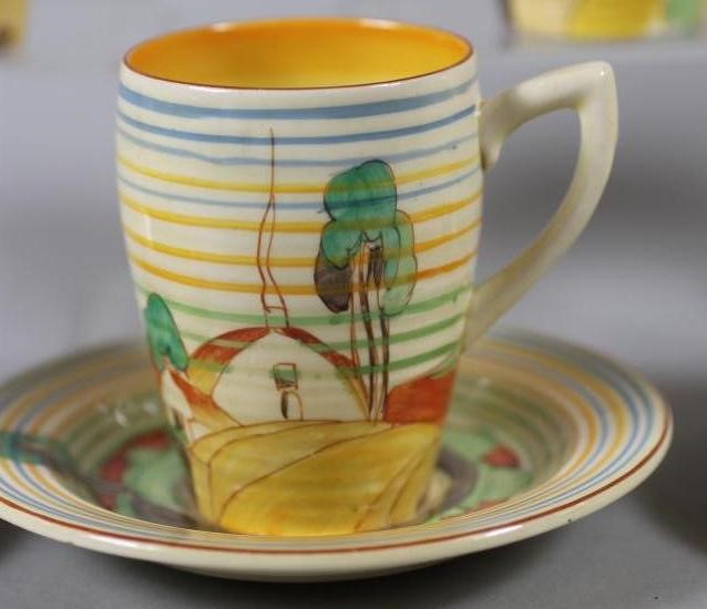 A SET OF SIX CLARICE CLIFF NEWPORT POTTERY COFFEE CUPS AND SAUCERS Image