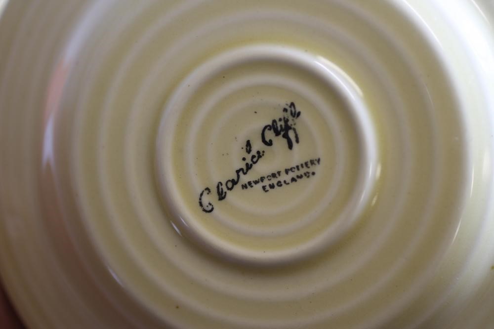 A SET OF SIX CLARICE CLIFF NEWPORT POTTERY COFFEE CUPS AND SAUCERS Image