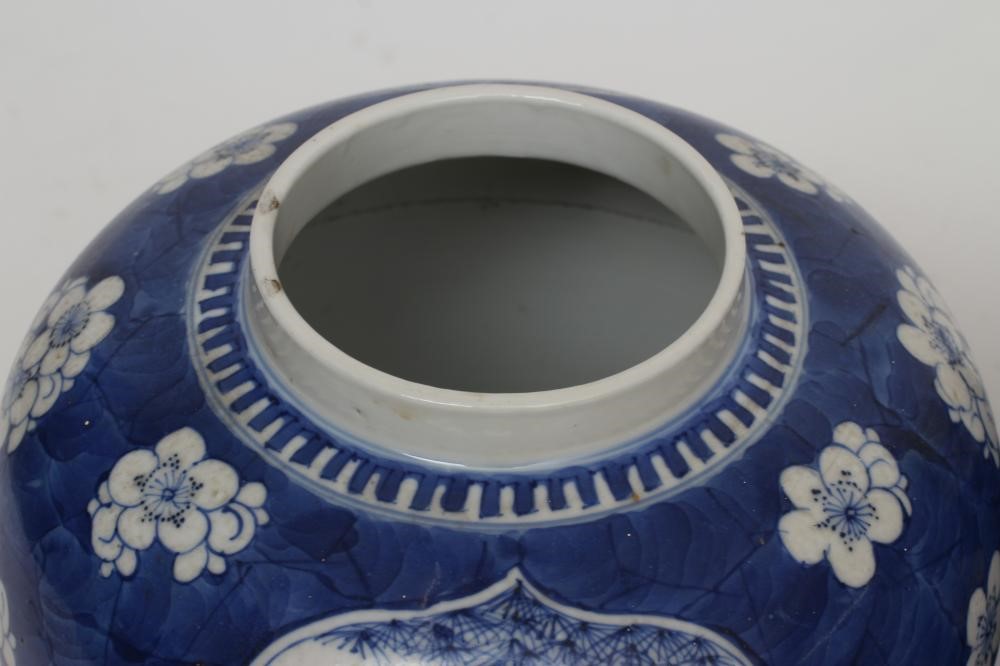 A PAIR OF CHINESE PORCELAIN JARS AND COVERS painted in underglaze blue with minaret panels enclosing Image