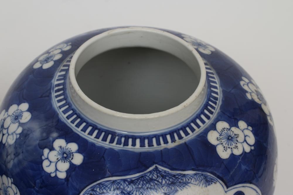 A PAIR OF CHINESE PORCELAIN JARS AND COVERS painted in underglaze blue with minaret panels enclosing Image