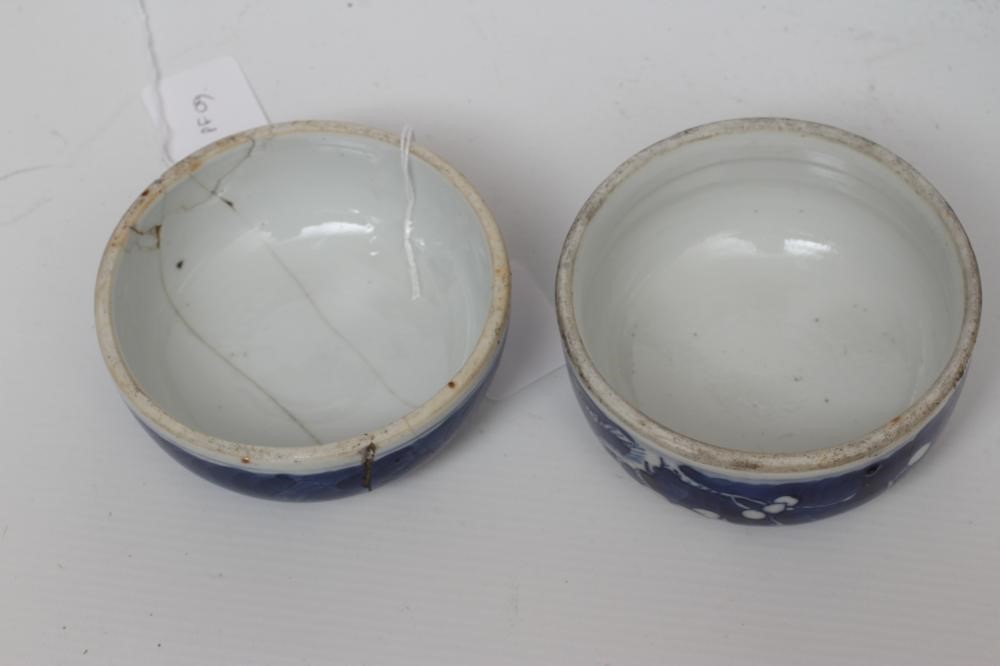 A PAIR OF CHINESE PORCELAIN JARS AND COVERS painted in underglaze blue with minaret panels enclosing Image