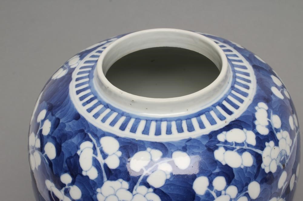 A CHINESE PORCELAIN JAR painted in underglaze blue with cracked ice and prunus Image