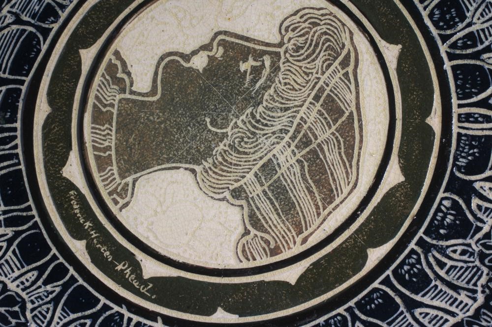 FREDERICK HURTEN RHEAD - an earthenware circular plaque Image