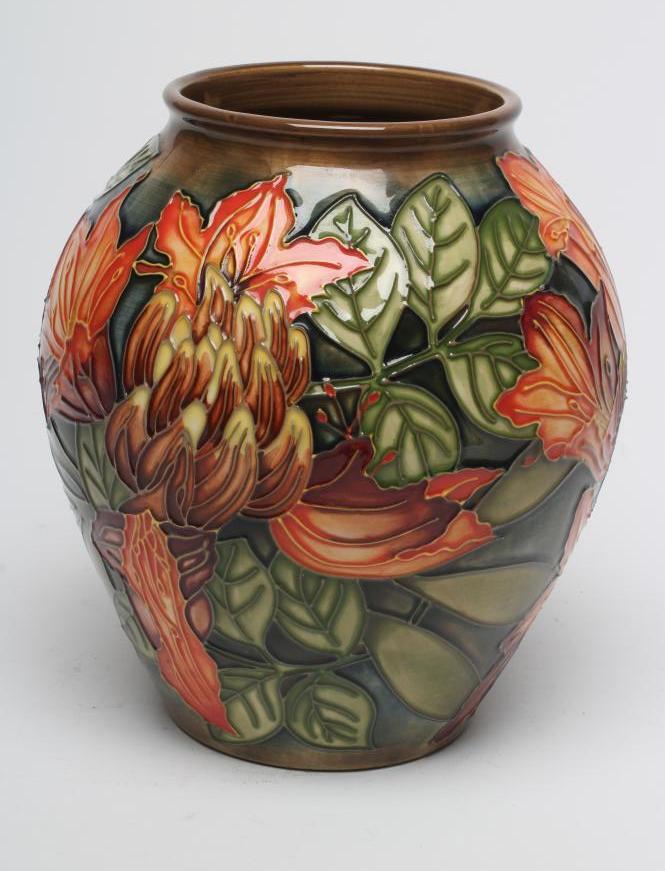 A MOORCROFT POTTERY FLAME OF THE FOREST PATTERN VASE Image