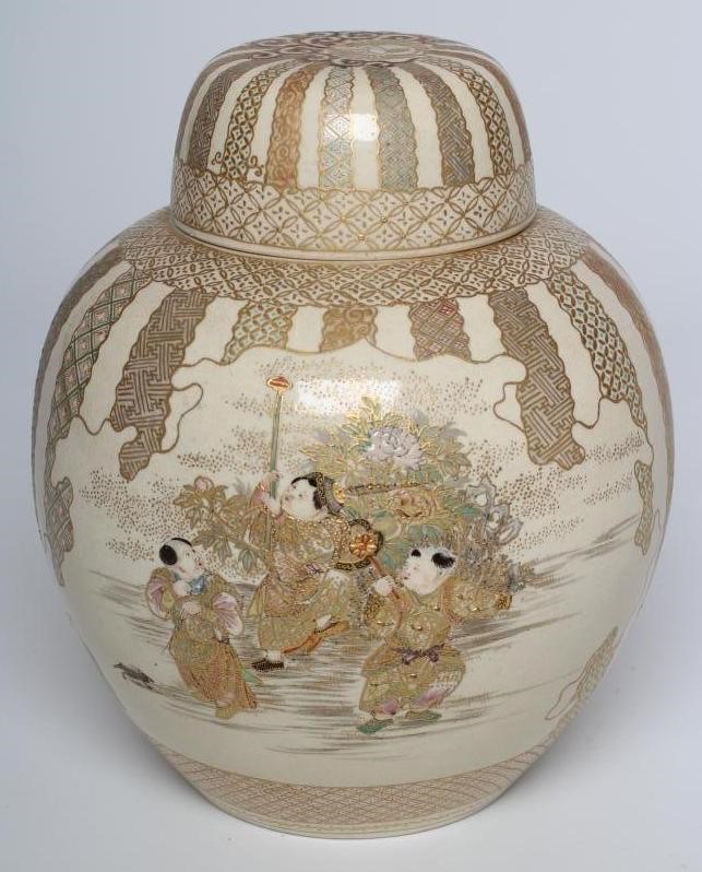 A SATSUMA EARTHENWARE JAR AND COVERS Image