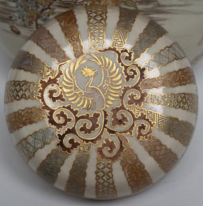 A SATSUMA EARTHENWARE JAR AND COVERS Image