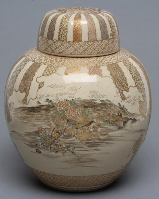 A SATSUMA EARTHENWARE JAR AND COVERS Image