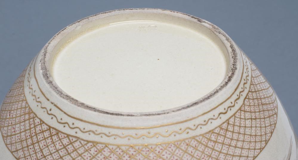 A SATSUMA EARTHENWARE JAR AND COVERS Image