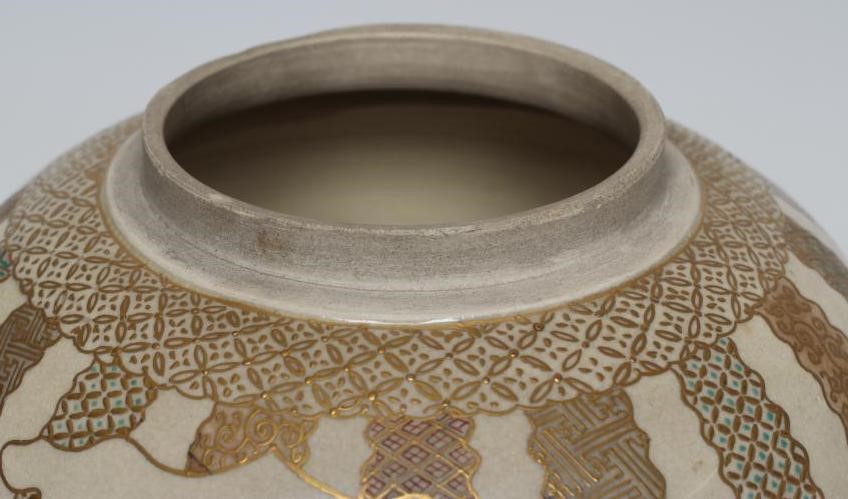 A SATSUMA EARTHENWARE JAR AND COVERS Image