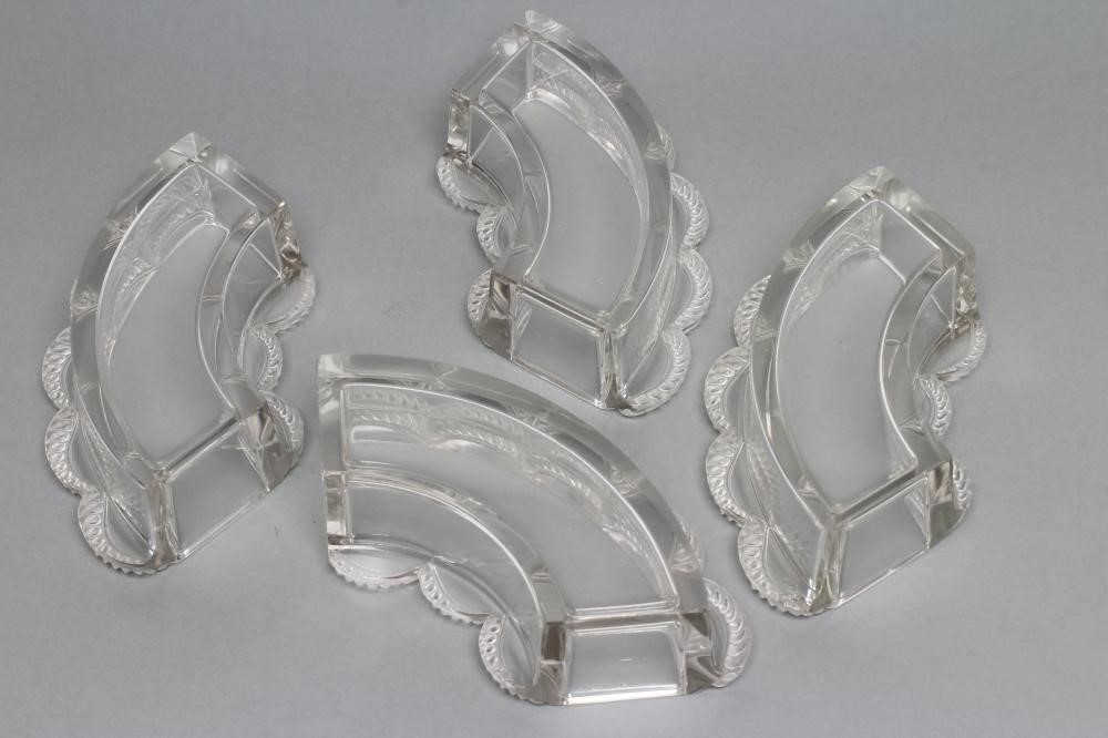 A LALIQUE CLEAR GLASS FOUR PIECE HORS D'OEUVRES SET Image