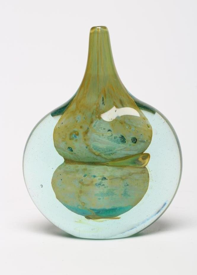 A M'DINA GLASS AXE-HEAD VASE of typical form with yellow and blue shaped interior to a green body Image