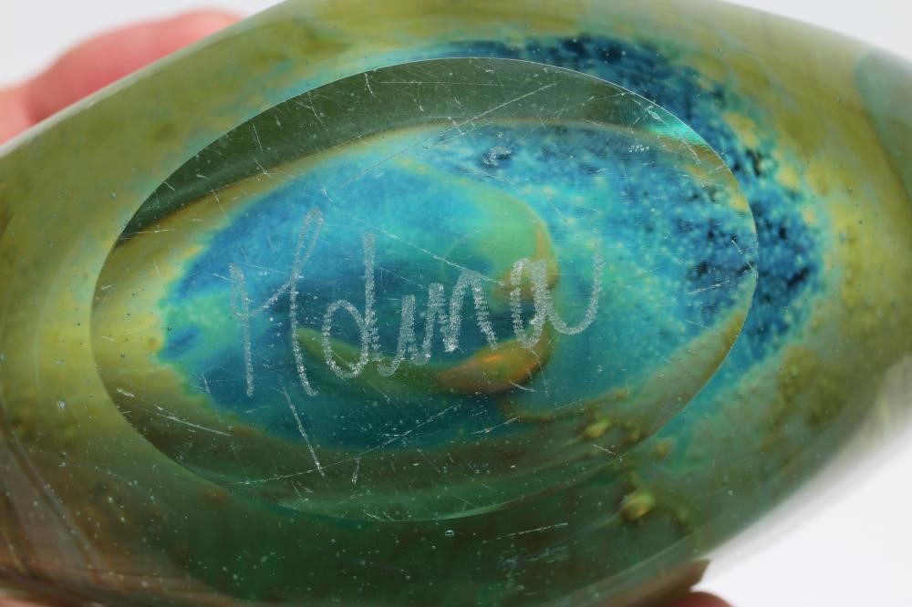 A M'DINA GLASS AXE-HEAD VASE of typical form with yellow and blue shaped interior to a green body Image