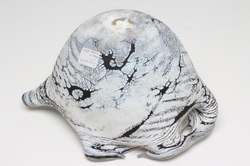 A PETER LAYTON FROSTED GLASS BOWL of abstract form with a dark blue dripped and mottled effect below Image