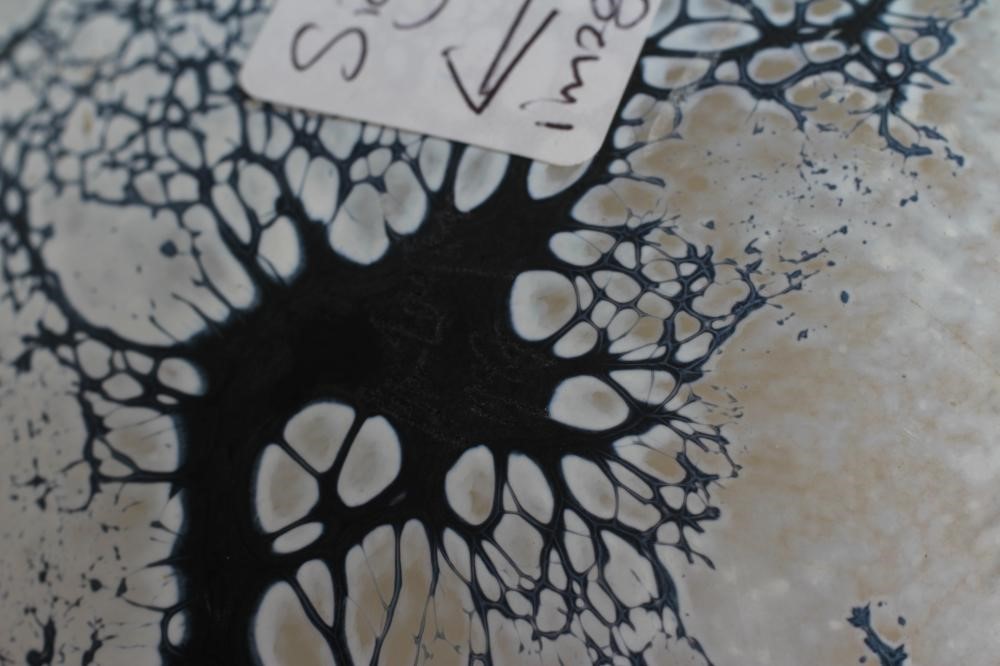 A PETER LAYTON FROSTED GLASS BOWL of abstract form with a dark blue dripped and mottled effect below Image