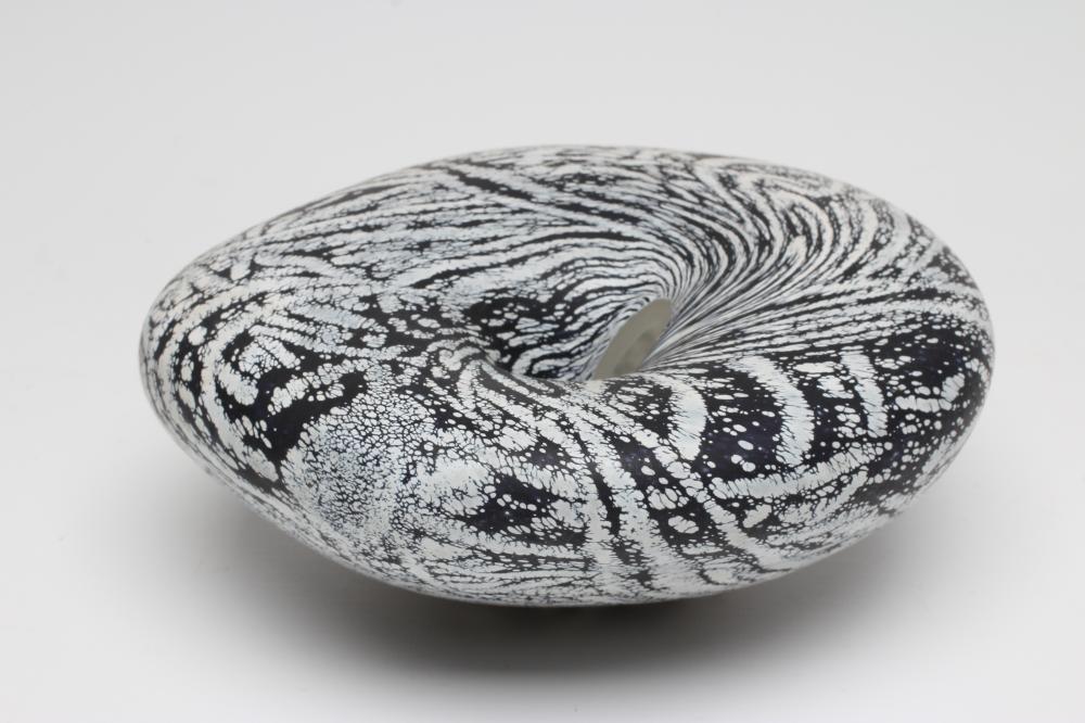 A PETER LAYTON GLASS "BOWL" of organic pebble form with a dark blue ripple and mottled effect Image