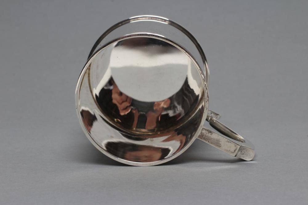 A SILVER CHRISTENING MUG Image