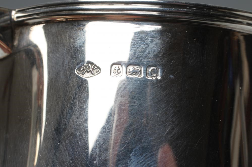 A SILVER CHRISTENING MUG Image