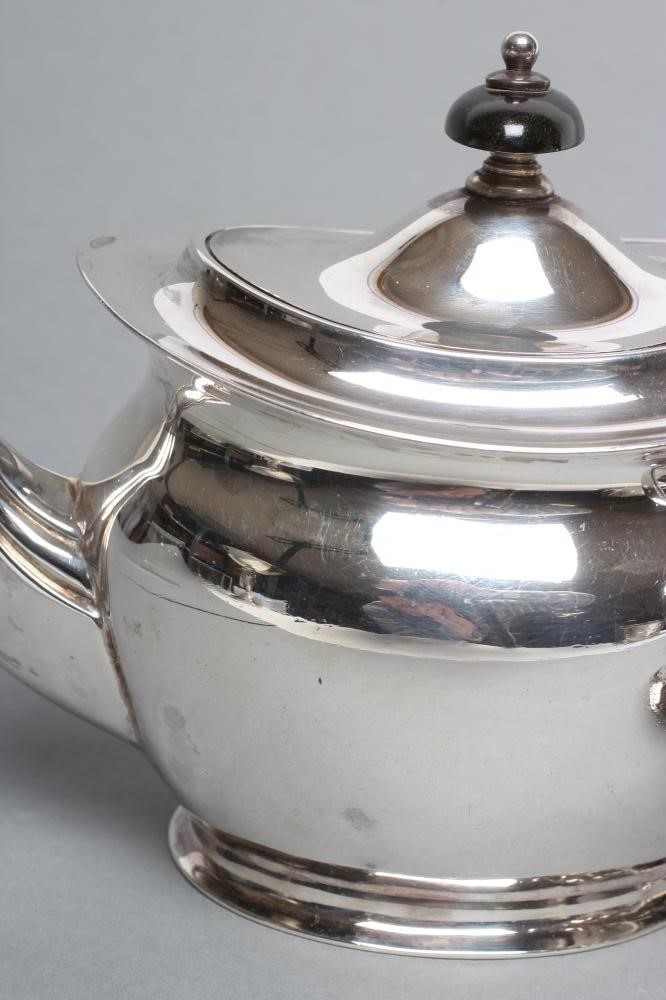 A SILVER BACHELOR'S TEAPOT AND SUGAR BASIN Image