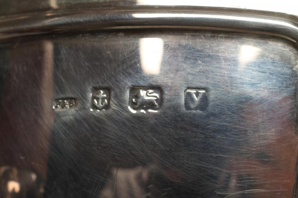 A FOUR PIECE SILVER TEA AND COFFEE SERVICE Image