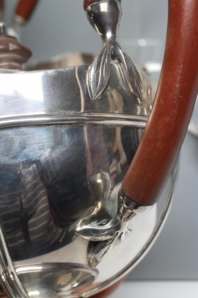 A FOUR PIECE SILVER TEA AND COFFEE SERVICE Image