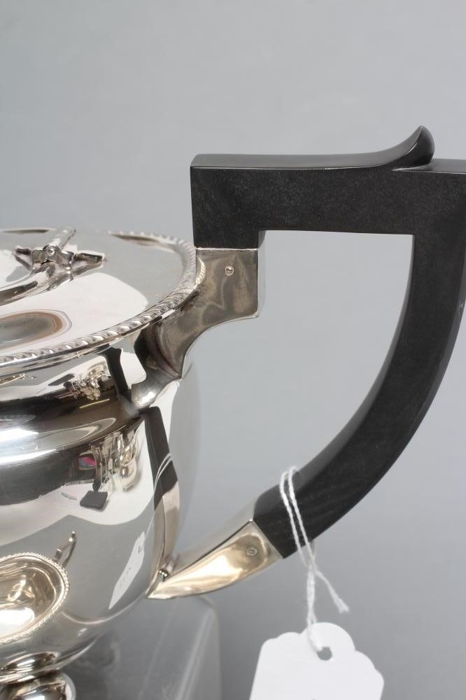 A FOUR PIECE SILVER TEA AND COFFEE SERVICE Image