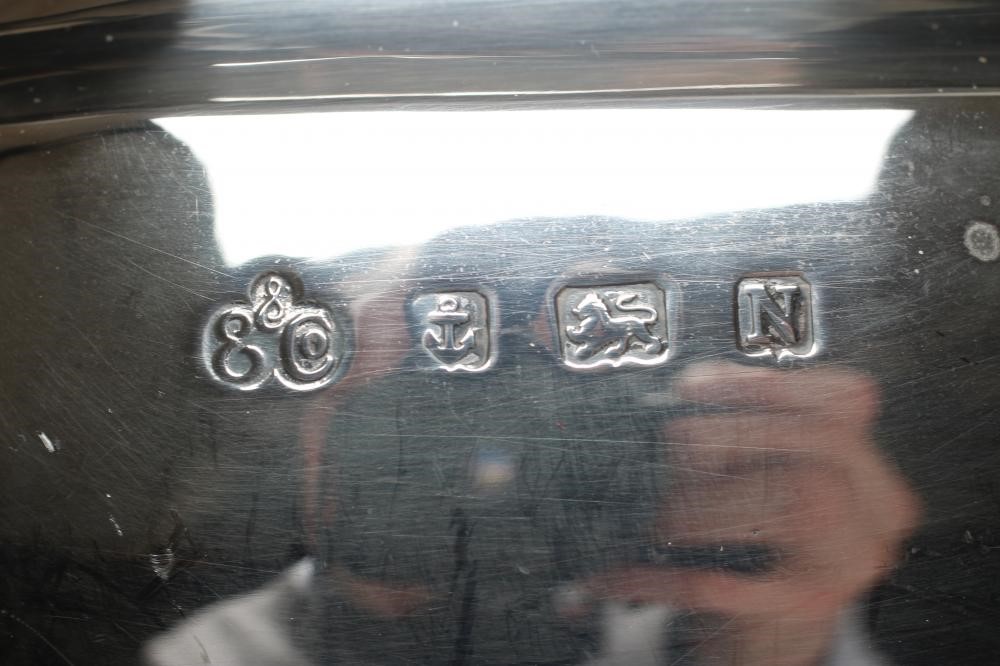 A FOUR PIECE SILVER TEA AND COFFEE SERVICE Image