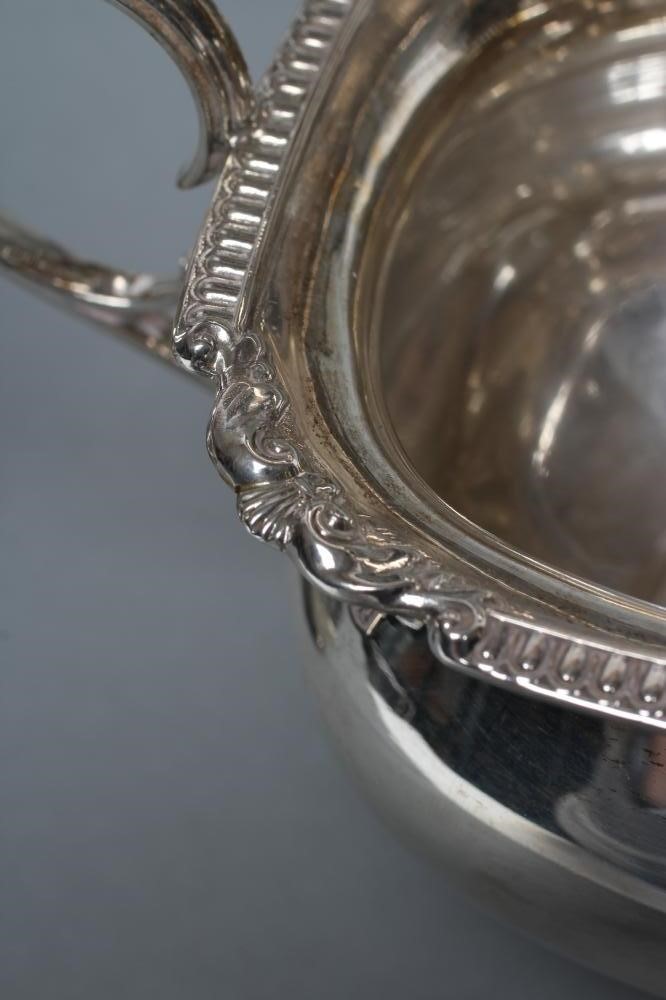 A FOUR PIECE SILVER TEA AND COFFEE SERVICE Image