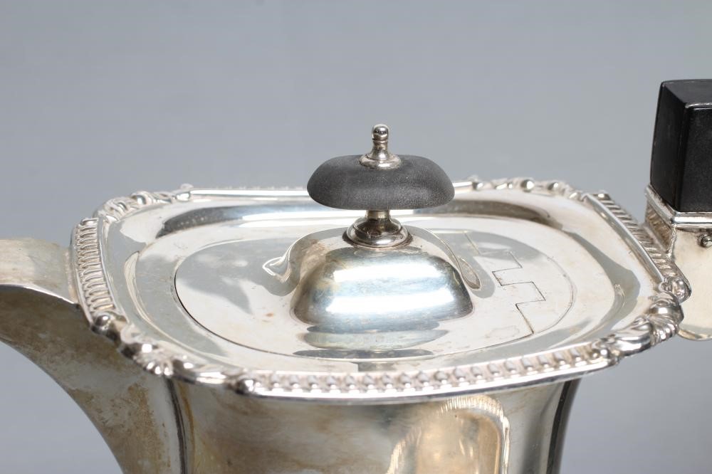 A FOUR PIECE SILVER TEA AND COFFEE SERVICE Image