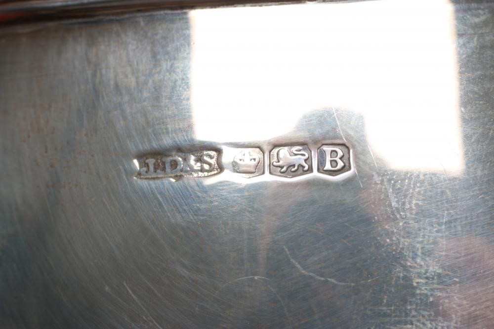 A SILVER THREE PIECE TEA SERVICE Image