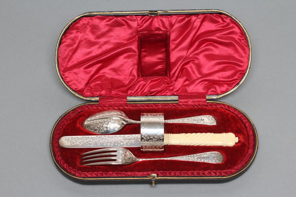 A LATE VICTORIAN SILVER FOUR PIECE CHRISTENING SET Image