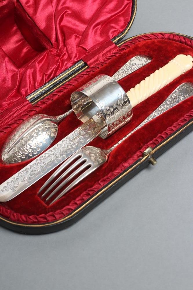 A LATE VICTORIAN SILVER FOUR PIECE CHRISTENING SET Image
