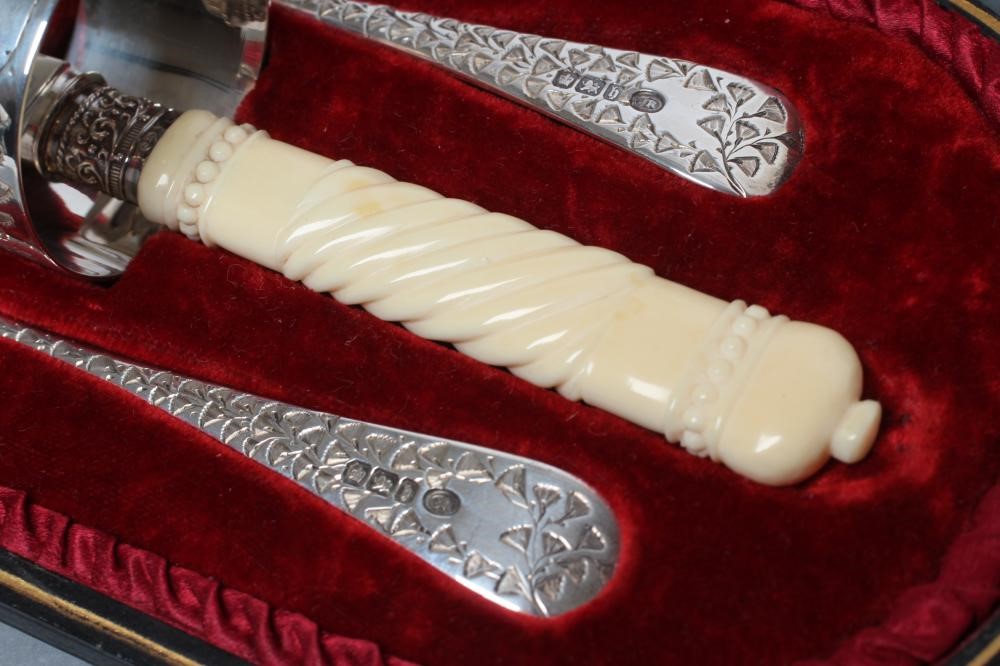 A LATE VICTORIAN SILVER FOUR PIECE CHRISTENING SET Image