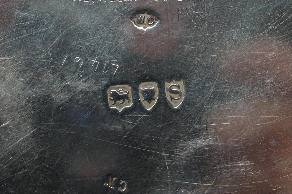 A LATE VICTORIAN SILVER QUAICHE Image