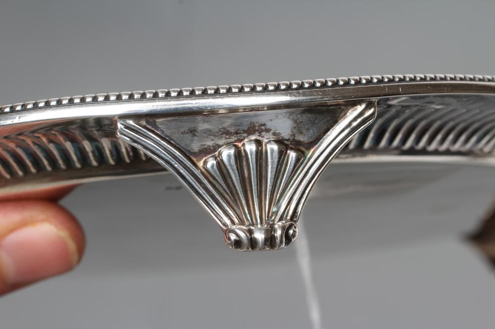 A VICTORIAN SMALL SILVER CIRCULAR SALVER Image