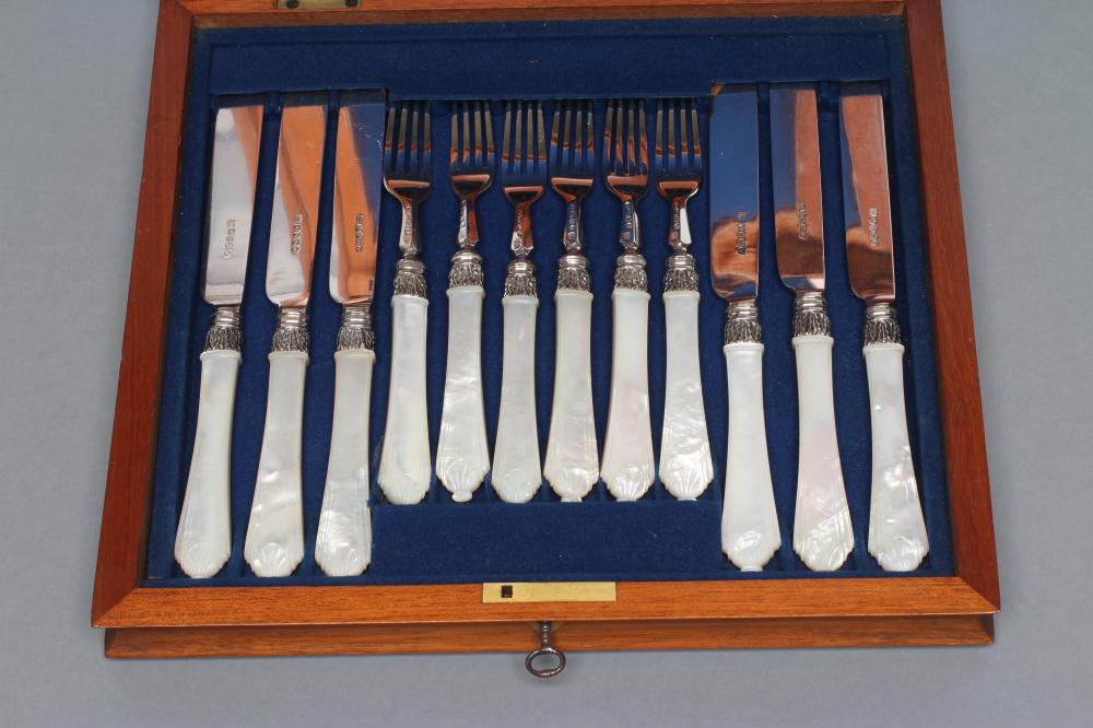 A SET OF SIX PAIRS OF VICTORIAN SILVER DESSERT KNIVES AND FORKS Image