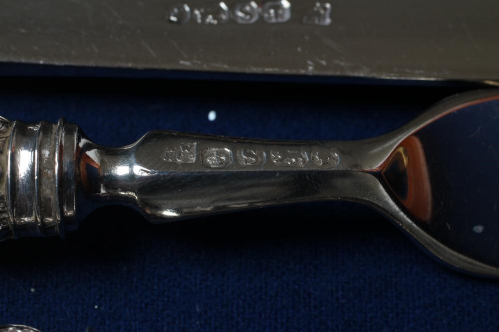 A SET OF SIX PAIRS OF VICTORIAN SILVER DESSERT KNIVES AND FORKS Image