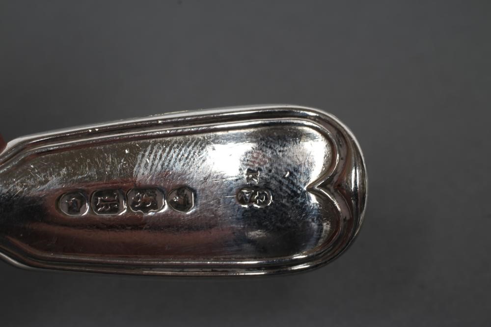 A PAIR OF VICTORIAN SILVER FIDDLE AND THREAD PATTERN MUSTARD SPOONS Image