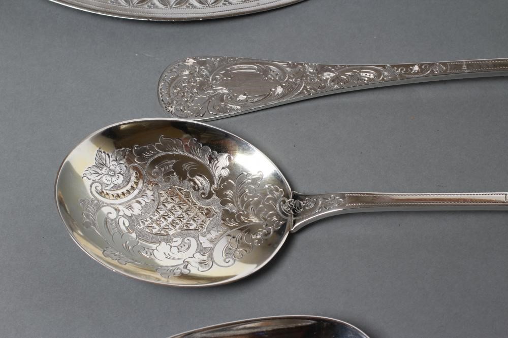 A PAIR OF LATE VICTORIAN SILVER SERVING SPOONS Image