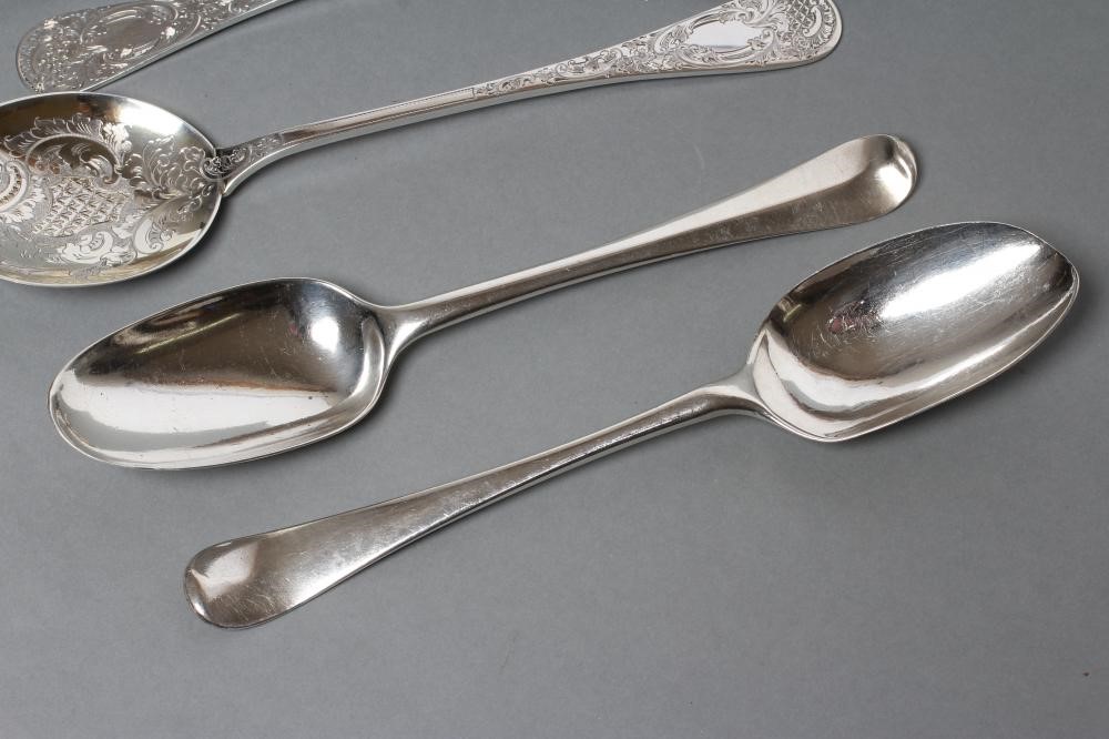 A PAIR OF LATE VICTORIAN SILVER SERVING SPOONS Image
