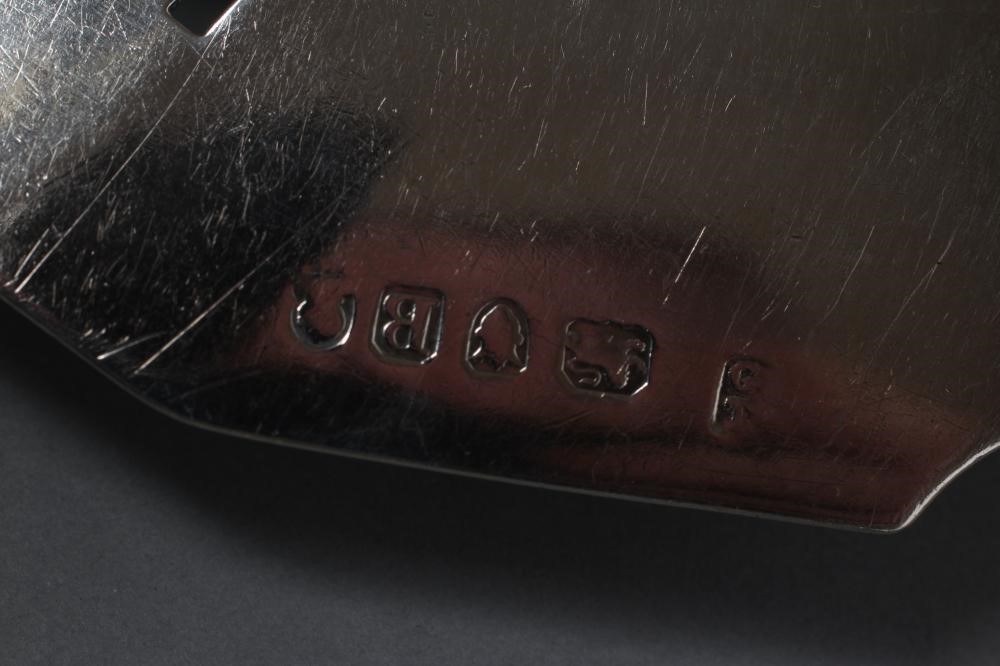 A PAIR OF LATE VICTORIAN SILVER SERVING SPOONS Image