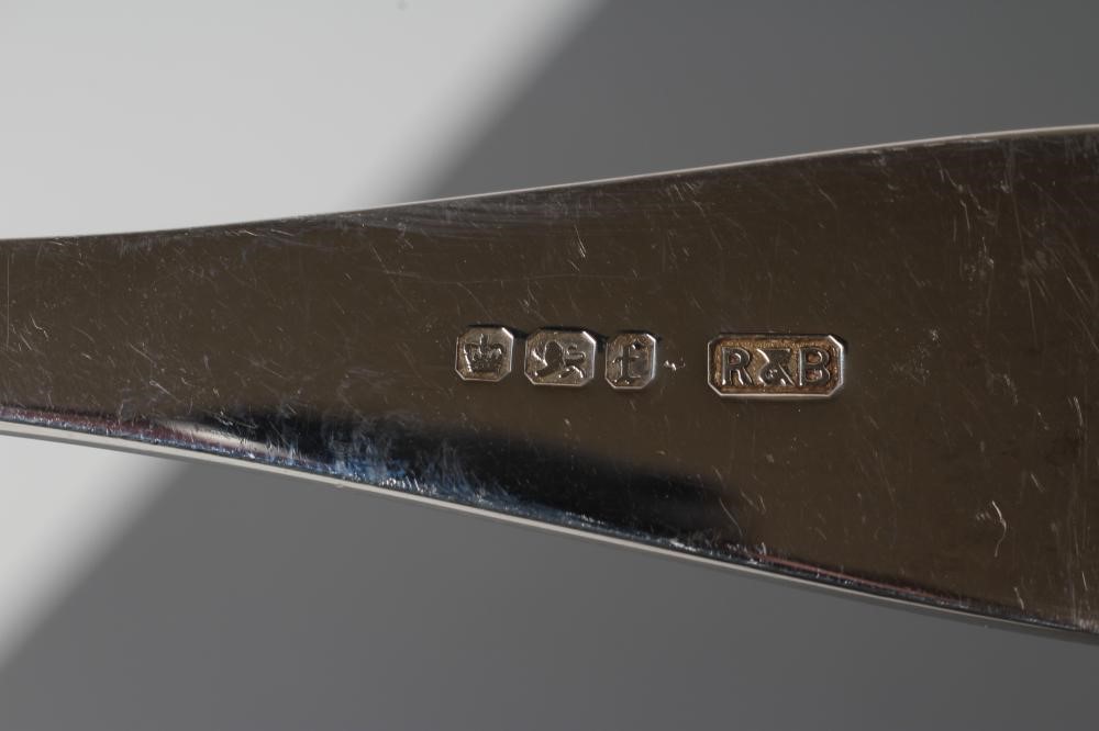 A PAIR OF LATE VICTORIAN SILVER SERVING SPOONS Image