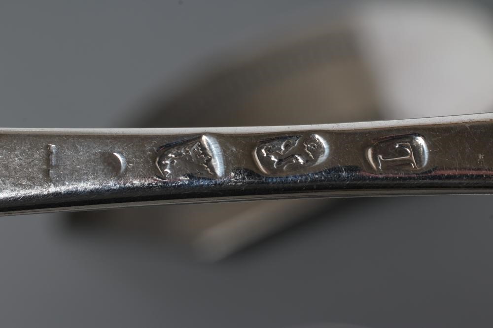 A PAIR OF LATE VICTORIAN SILVER SERVING SPOONS Image