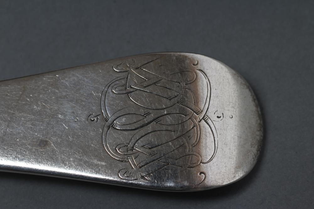 A PAIR OF LATE VICTORIAN SILVER SERVING SPOONS Image