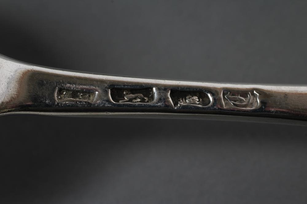 A PAIR OF LATE VICTORIAN SILVER SERVING SPOONS Image